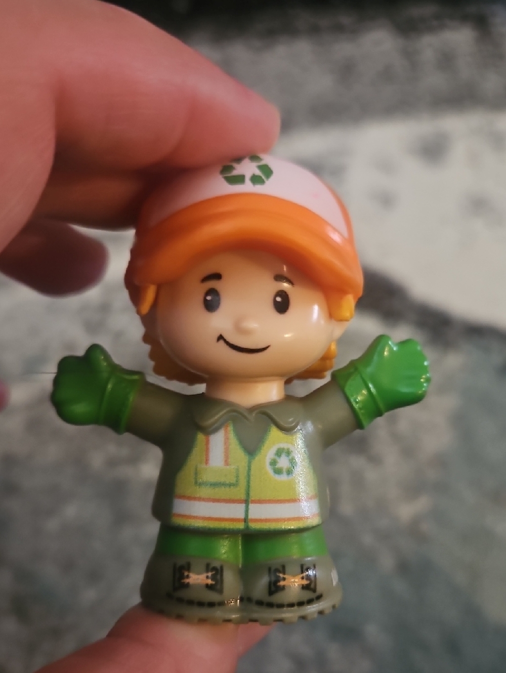 Fisher-Price Little People Recycling Worker figure. [1, 2]